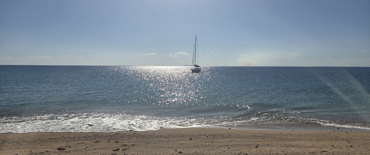 Standing on the shore in Russian Bay after delivering the yacht to Nosy Be, Madagascar